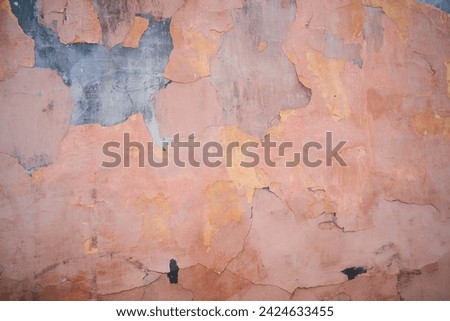 An old scratched beige wall. Can be used as a background. 