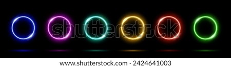 Glowing light neon abstract circles on black background. Color led round electric frames. Geometric vector illustration set. Empty blue, pink, green, purple, red, yellow rings art decoration design.