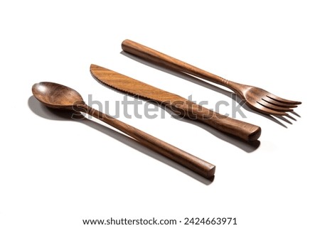 cutlery made of wood in white background