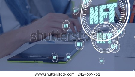 Image of nft in circles over hands of caucasian man using tablet. digital resources and technology concept digitally generated image.