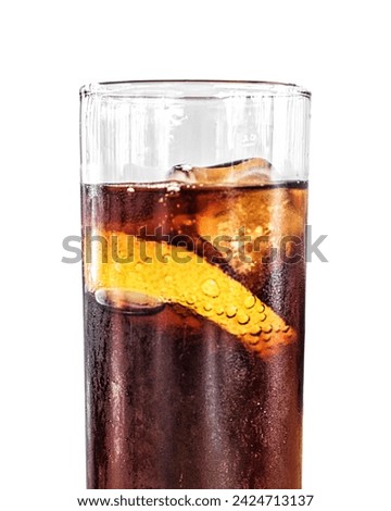 cola with ice and fresh lemon in glass on white background