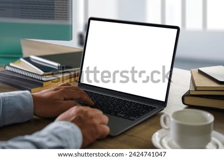 man using laptop screen blank, mockup work at home office Copy Space
