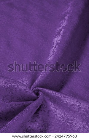 Lilac blue silk fabric. Smooth elegant green silk or satin luxury fabric texture can be used as an abstract background. Luxury background design. Texture, pattern
