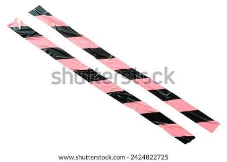 Black and pink barricade tape on white background with clipping path