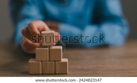 Blank wooden cubes on the table with copy space, empty wooden cubes for input wording, and an infographic icon.