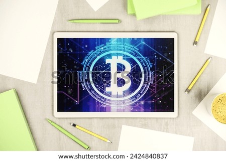 Creative Bitcoin concept on modern digital tablet screen. Top view. 3D Rendering