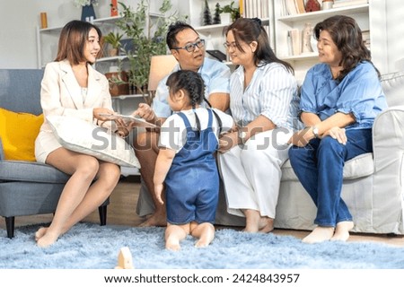 Real estate woman agent holding contract to buy and sell and life insurance to family for signature, consultant talk in house for sale.asian father signing contract.business and real estate concept