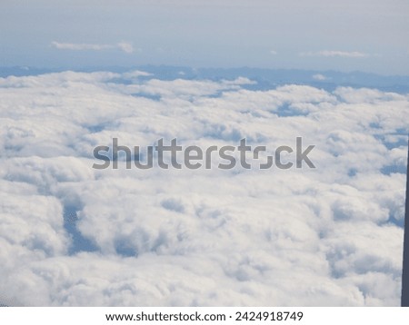 View above the clouds from an airplane