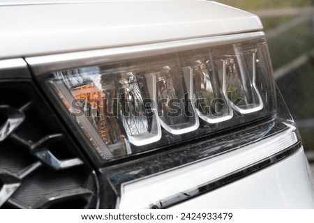 Led headlamp  in modern car macro close up view