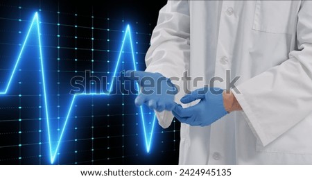 Image of life line over caucasian doctor on black background. Global medicine, technology, data processing and digital interface concept digitally generated image.