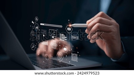 Digital marketing commerce online sale concept.Businessman using computer for analysis SEO Search Engine Optimization Marketing Ranking Traffic Website Internet Business Technology Concept.