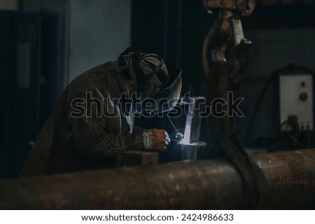 Welder master welding steel or iron, metal industry concept photo Stock Photo