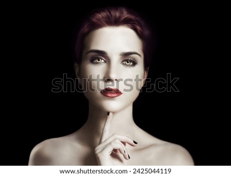 Vampire, woman and gothic makeup in studio for beauty, cosmetics and dark aesthetic with thinking or scary face. Portrait of villain character, fantasy cosplay and contact lens on a black background