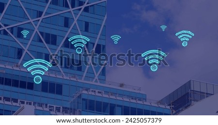 Image of digital wifi icons flying over cityscape. Global cloud computing, connections and data processing concept digitally generated image.
