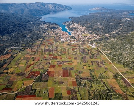 View of Stari Grad Plain Hvar Island in Croatia. The Stari Grad Plain is an incredible Unesco World Heritage Site, where the farming techniques practically haven’t changed since the 4th century BC. Royalty-Free Stock Photo #2425061245