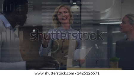 Image of statistics and data processing over diverse business people in office. Global business, communication, digital interface, finance and data processing concept digitally generated image.