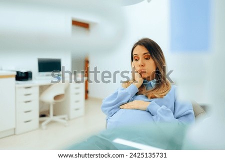 
Pregnant Dental Patient Suffering from a toothache and Sore Gums
Unhappy mother to be having teeth problems during pregnancy
 Royalty-Free Stock Photo #2425135731