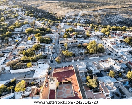 Bird's-eye view of Mineral de Pozos, Guanajuato, capturing the essence of this tranquil Mexican town with its traditional streets and rustic charm.