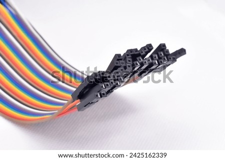 Colorful wires for micro-controller on the white background Royalty-Free Stock Photo #2425162339