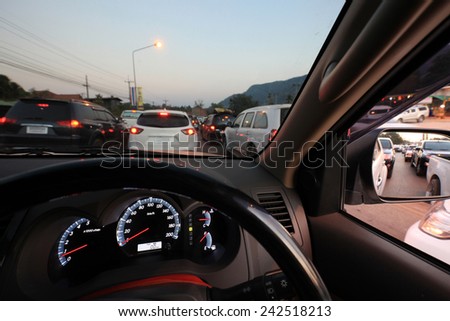 the car console, waiting in a traffic jam Royalty-Free Stock Photo #242518213