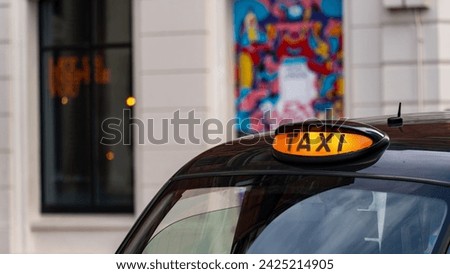 Taxi with it's sign on ready for hire