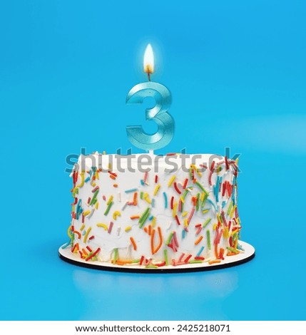 3 shaped candle light on happy birthday cake on blue
