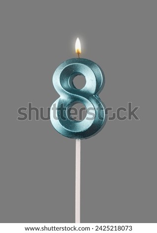 8 birthday, number candles with light, isolated on white background