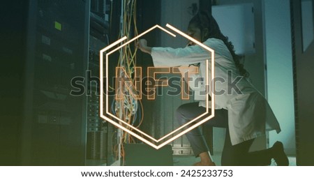 Image of nft text over african american female worker in server room. global business, cloud computing and digital interface concept digitally generated image.