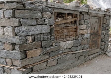 Village country house walls made of stones and dried wood. House walls in the village of Turtuk in  Ladakh,India
