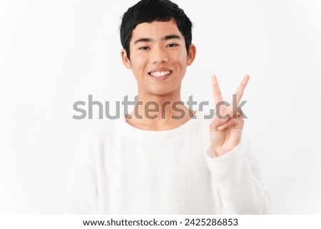 Lifestyle image of a junior high school male in casual clothes