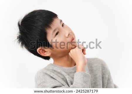 Lifestyle image of an elementary school boy in casual clothes
