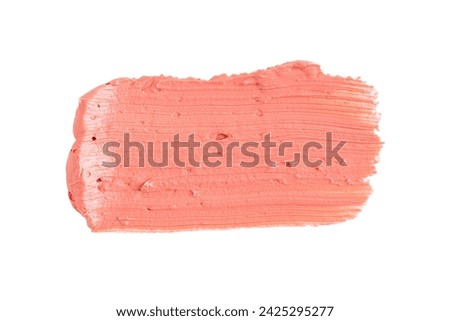 Orange clay mask smear smudge isolated on white background. Cream texture. Facial mask, skincare beauty product swatch closeup. SPA background. 