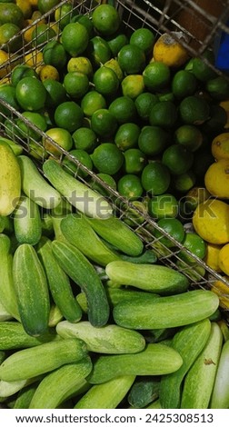 cucumber and lime fresh vegetable from garden, picture can use advertisement