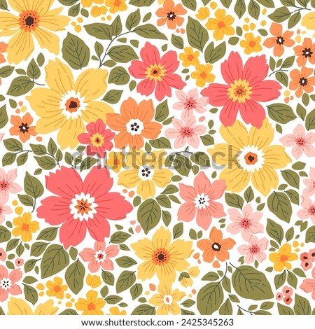 Beautiful floral pattern in small abstract flowers. Small red, coral and yellow flowers. White background. Ditsy print. Floral seamless background. Liberty template for fashion prints. Stock pattern.
