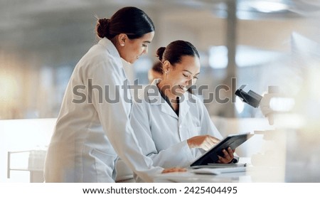 Scientist, women and teamwork on tablet and computer for laboratory advice, medical research and night planning. Students, science people or mentor on digital technology of test results or comparison