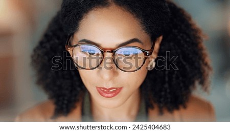 Business woman, reading and research on computer for online project, article review and editing or night analysis. Happy african editor or journalist with screen in glasses reflection for news report