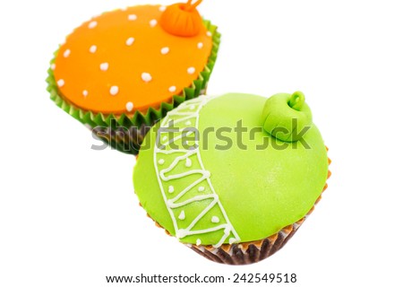 Christmas cupcakes on white background