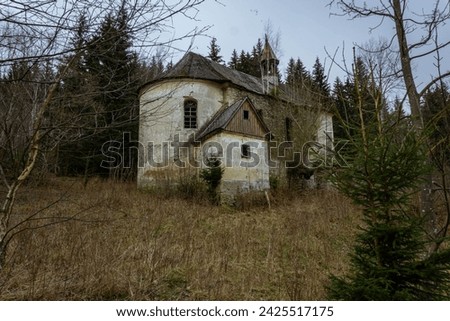 old historic architecturally interesting abandoned church in the mountains in Poland in early spring Royalty-Free Stock Photo #2425517175