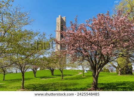 Spring cherry trees blossom at Deeds Carillon Historical Park in Dayton Ohio.  Royalty-Free Stock Photo #2425548485