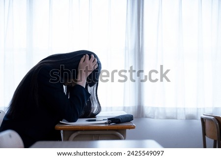 Images of students struggling with exams, grades, etc.　 Royalty-Free Stock Photo #2425549097