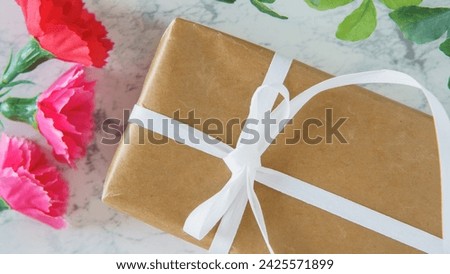 White marble background with presents.