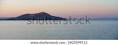 Water, mountains, sky and sunset atmosphere