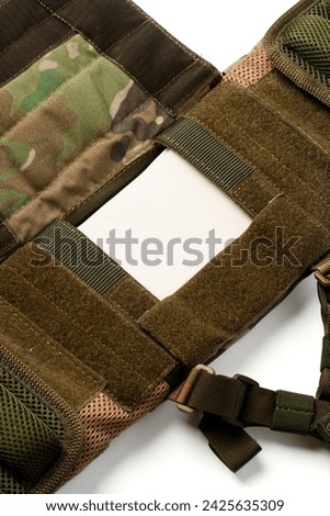 Close up of tactical bulletproof vest on white background
