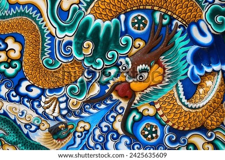 Carving colorful Chinese dragon wall background