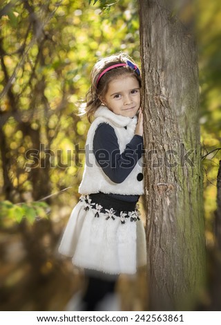 Portrait of a little girl in park