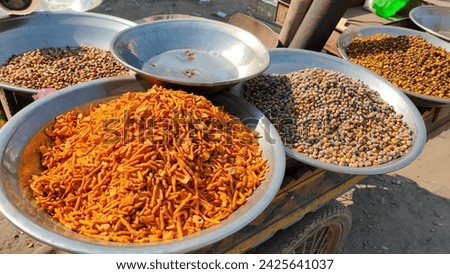 Mobile stall of nimko and roasted peas Royalty-Free Stock Photo #2425641037