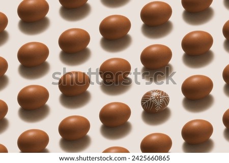 Brown easter eggs knolling concept on white background.