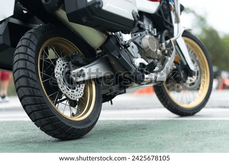Motorcycle in a sunny motorbike on the road riding.with sunset light. copyspace for your individual text.On the road.	 Touring Bike motorcycle.	 Royalty-Free Stock Photo #2425678105