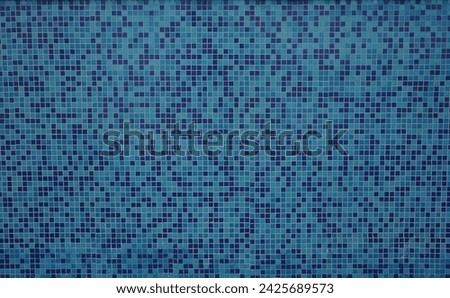Pattern of Blue mosaic tiles on the wall texture background. Blue mosaic old dirty tiles for bathroom or swimming pool. Ceramic square decorative tile. Abstract texture background.