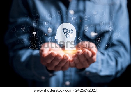 Education and E-learning concept. Person holding education icon on virtual screen. Participating in online lessons for Internet technology for education.